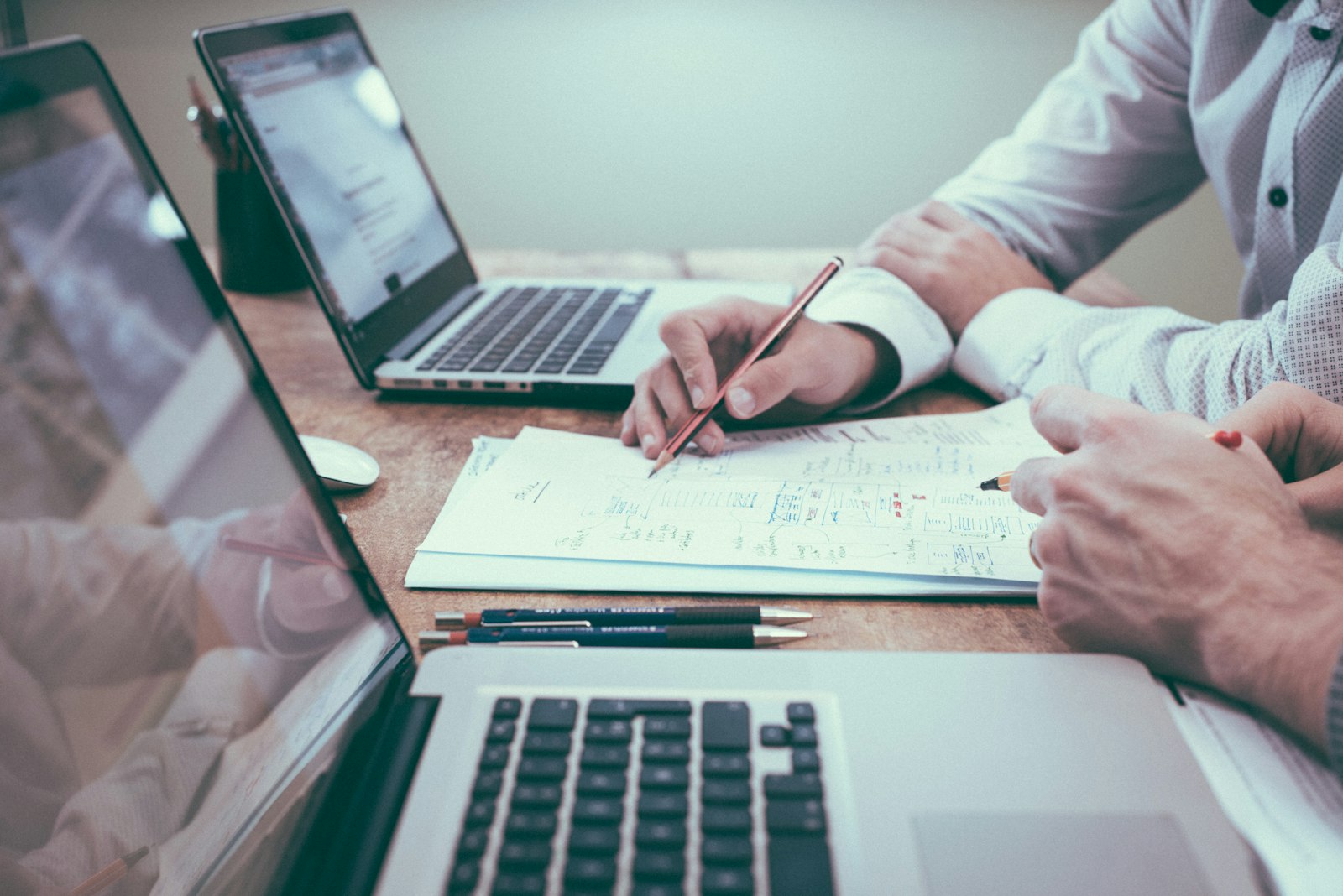 Accounts and documents being reviewed at a desk