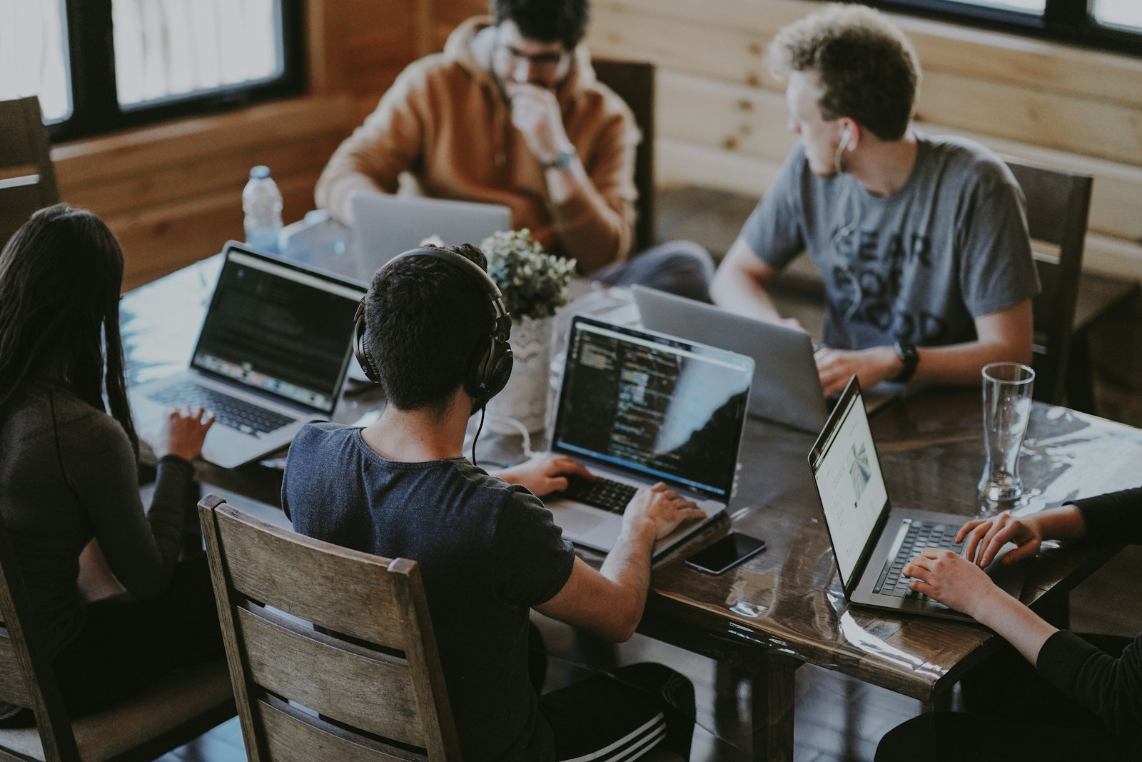 A team working together on laptops